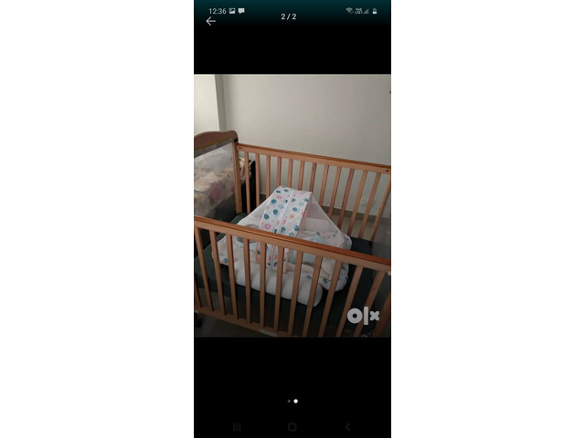 movable mattress in crib