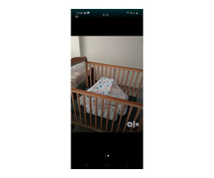 Crib with adjustable one side, movable wheels and also mattress - Image 1/2