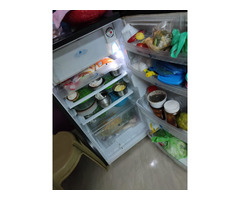 Fridge, Gas stove, Tv, Mixer grinder, plastic table and chairs, stools - Image 1/2