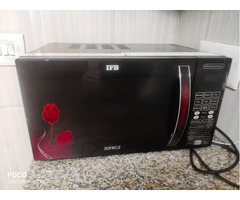 IFB 30 L Convection Microwave Oven Rarely used in Mint condition (Floral Pattern) - Image 1/4