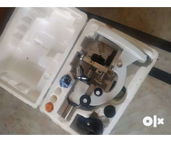 microscope with 3 lenses and 2 already prepared slides. - Image 2/2