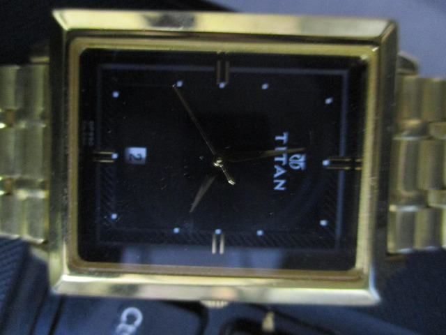 Refurbished discount titan watches