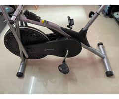 Stainless Steel Exercise Bike with Moving Handle, Back Support and Adjustable Cushi - Image 1/3
