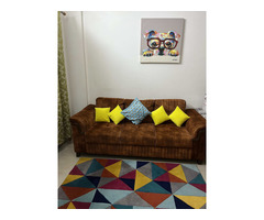 Sofa with carpet, cushions and painting - Image 1/2