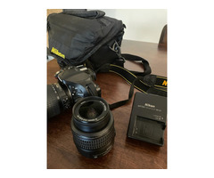 The classic NIKON DSLR D5200 with normal + zoom lens - Image 4/5