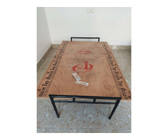 Folding ply-wood bed with cotton mattress, pillow and a folding table - Image 1/4