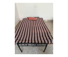 Folding ply-wood bed with cotton mattress, pillow and a folding table - Image 4/4