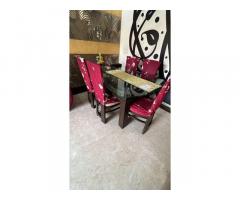 6 seater dining table with getching work glass top
