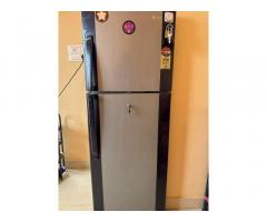 front load washing machine and double door fridge