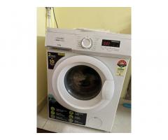 front load washing machine and double door fridge
