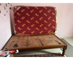 Double or full-size bed with foam mattress