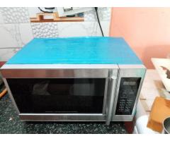 Deep freezer, big oven, stove, cot, matressmcylinder gas