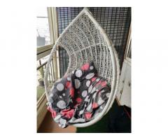 Hanging chair with cushion