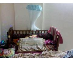Baby's Brown Wooden Crib - Image 1/2