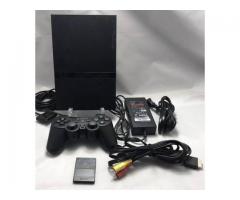 PLAYSTATION 2 SLIM CONSOLE WITH ACCESSORIES AND SOME GAMES INSTALLED IN 32GB PENDRIVE. - 1